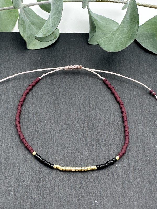 Armband Cadi Miyuki gold weinrot schwarz, liebevolle Handarbeit aus Klagenfurt